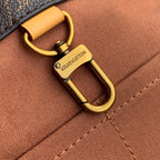 Louis Vuitton monogram bag D-ring hardware with tan leather handle attachment