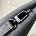 Men's Louis Vuitton leather bag with metal D-ring and adjustable strap attachment