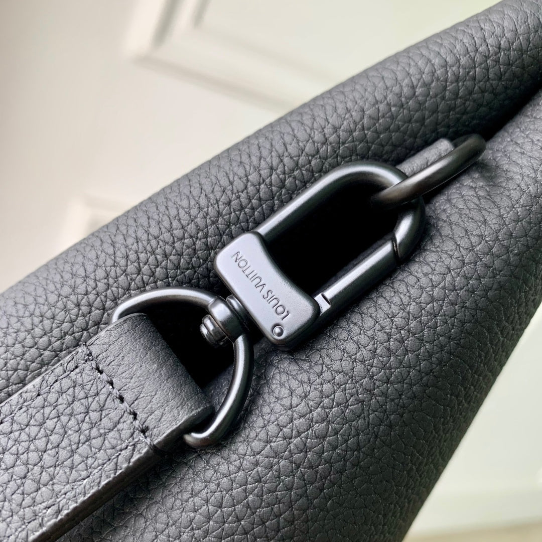 Men's Louis Vuitton leather bag with metal D-ring and adjustable strap attachment