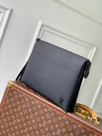 Men's Louis Vuitton leather bag in dark blue with LV logo, side zipper detail