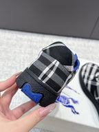 Heel and side of check-pattern sneaker with blue traction detail on sole