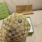 Gucci cap in beige GG canvas with round top button detail