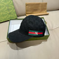 Black Gucci baseball cap with GG pattern and NY stripe logo