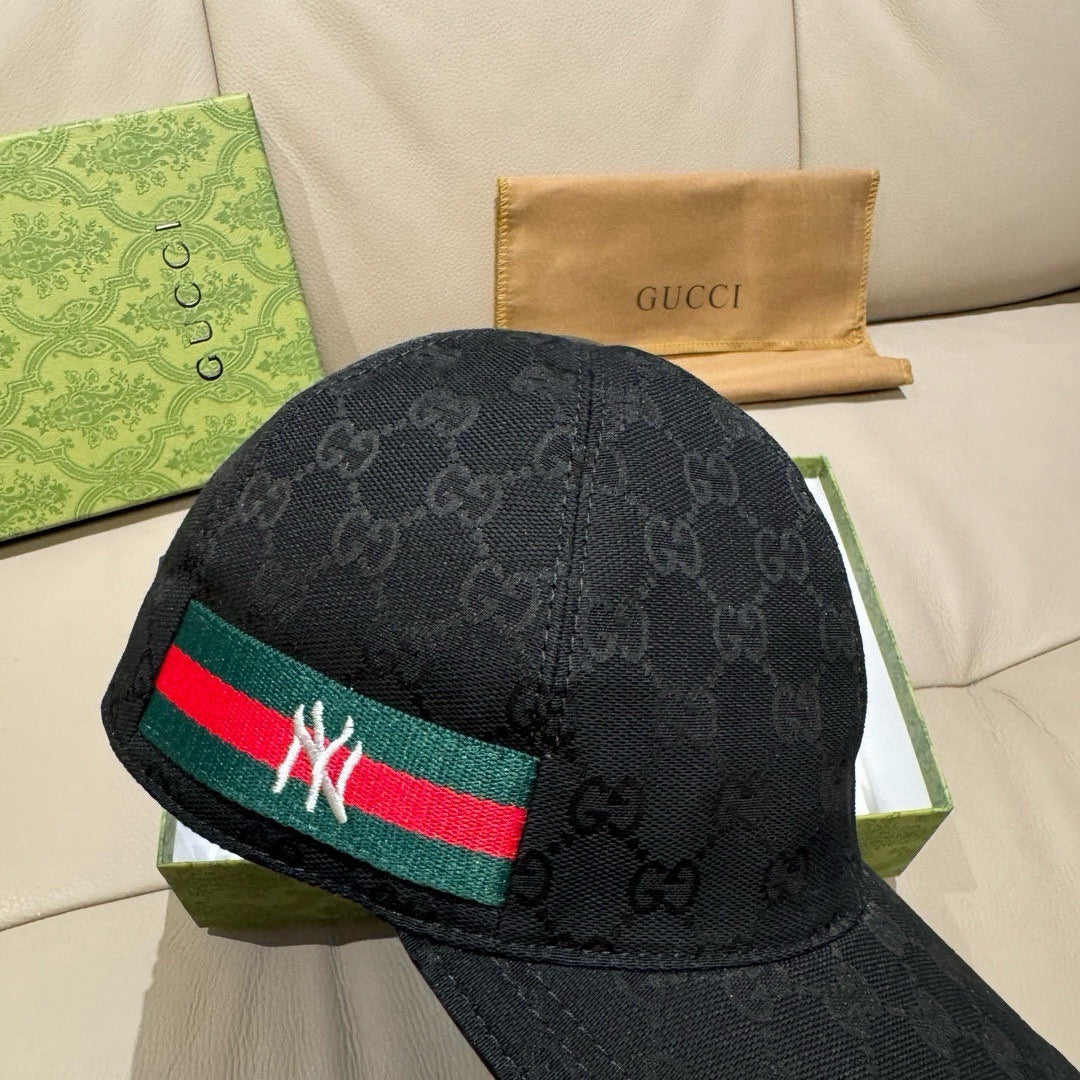 Black baseball cap with GG pattern and NY stripe on the front