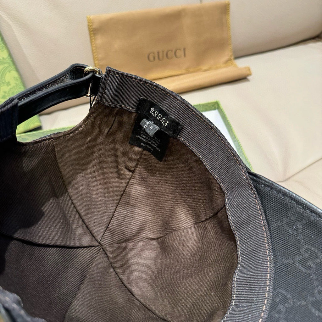 Black baseball cap interior with fabric lining and Gucci label