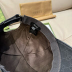 Black baseball cap interior with fabric lining and Gucci label