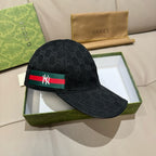 Black baseball cap with GG monogram pattern and green-red NY logo strap