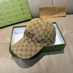 Gucci baseball cap in brown GG monogram canvas, curved brim and adjustable strap.