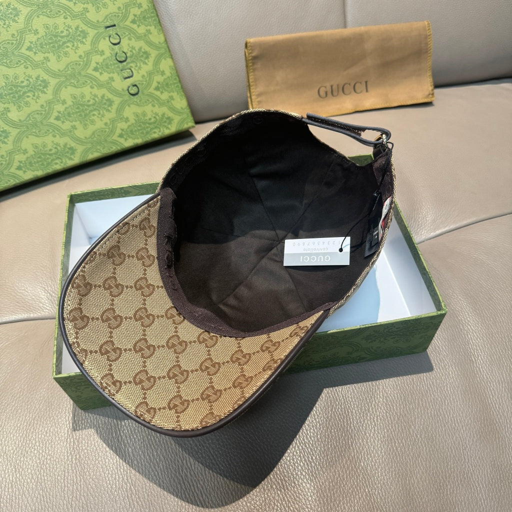 Black-lined GG monogram baseball cap with curved brim, showing interior.