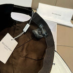 Balenciaga logo cap detail: white crown with black adjustable strap and tags
