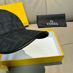 Fendi black baseball cap close-up of curved brim and textured fabric