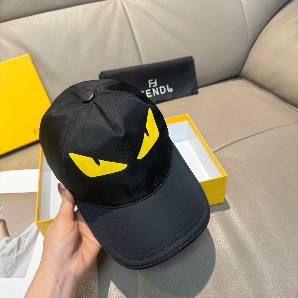 Fendi cap, black with bold yellow face graphic and stitched curved brim
