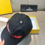Fendi cap in black with red logo graphic and top button detail.