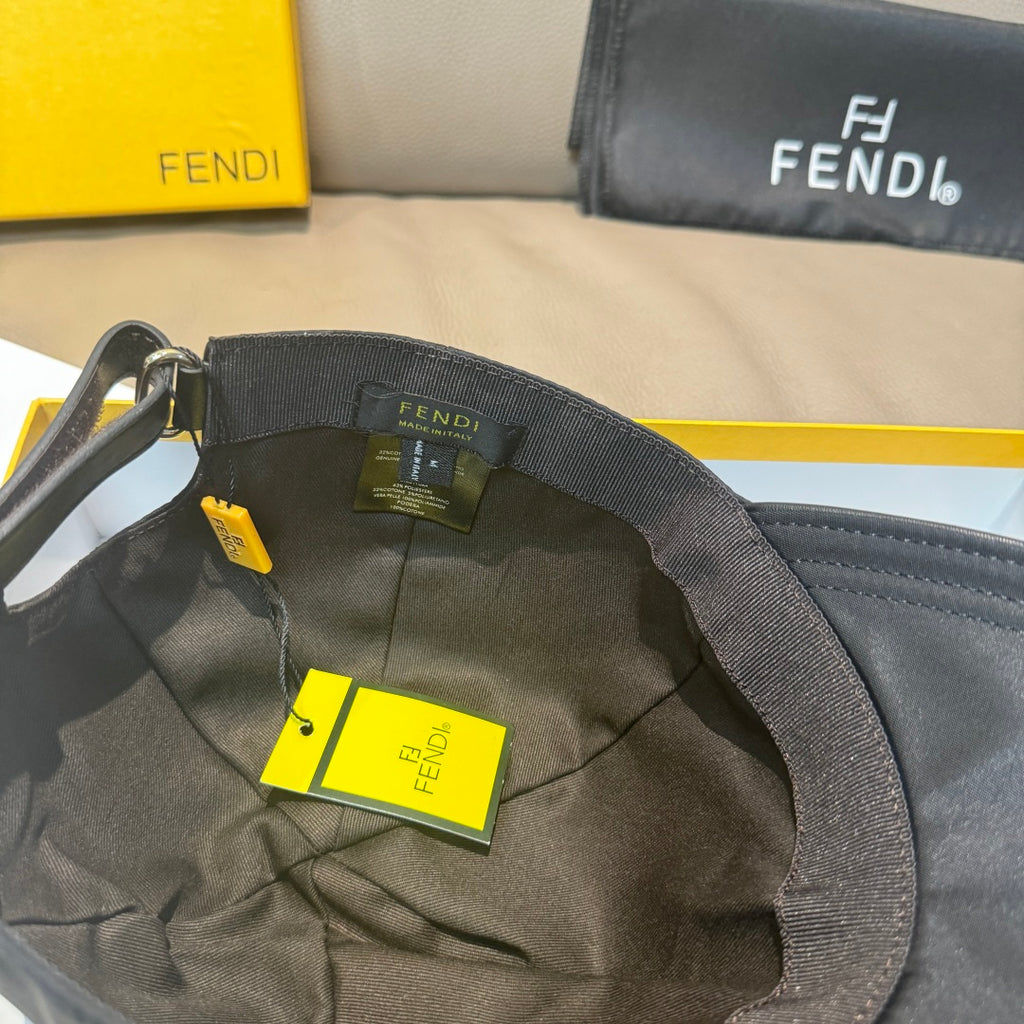 Fendi cap interior view with adjustable strap and woven label tags.