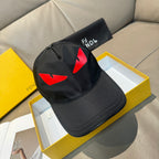 Fendi cap in black with red logo on front panel and curved brim.