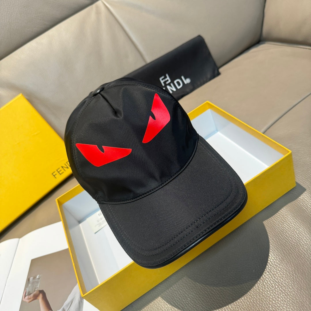 Fendi cap in black with red logo on front panel and curved brim.
