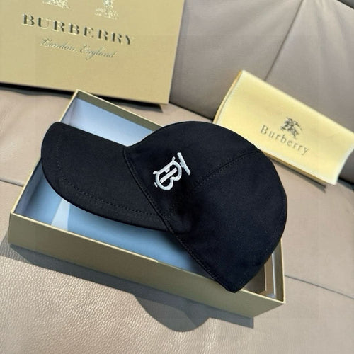 Dark baseball cap with front monogram logo and curved brim