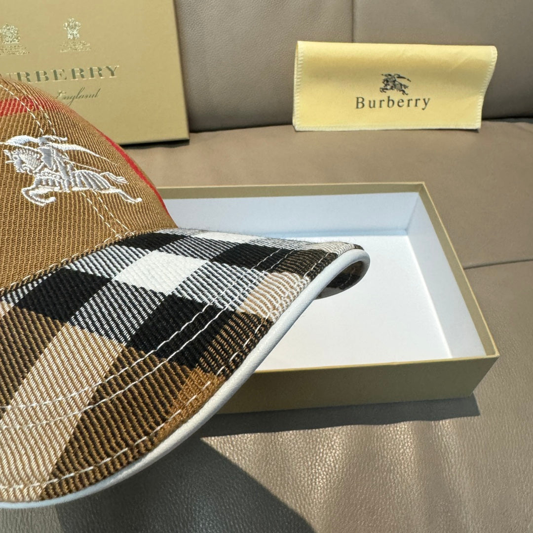 Burberry cap showing side plaid panels and horse emblem on front.