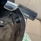 Chanel cap detail, dark trim and adjustable strap inside, mint CC pattern edge.
