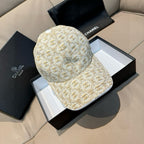 Chanel patterned baseball cap, beige with gold monogram print, curved brim, top button.