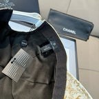 Beige patterned baseball cap with black interior label and fabric tag at side seam.