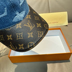 Denim baseball cap brim detail with dark LV monogram canvas pattern