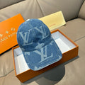 Louis Vuitton denim cap with large blue monogram print, curved brim