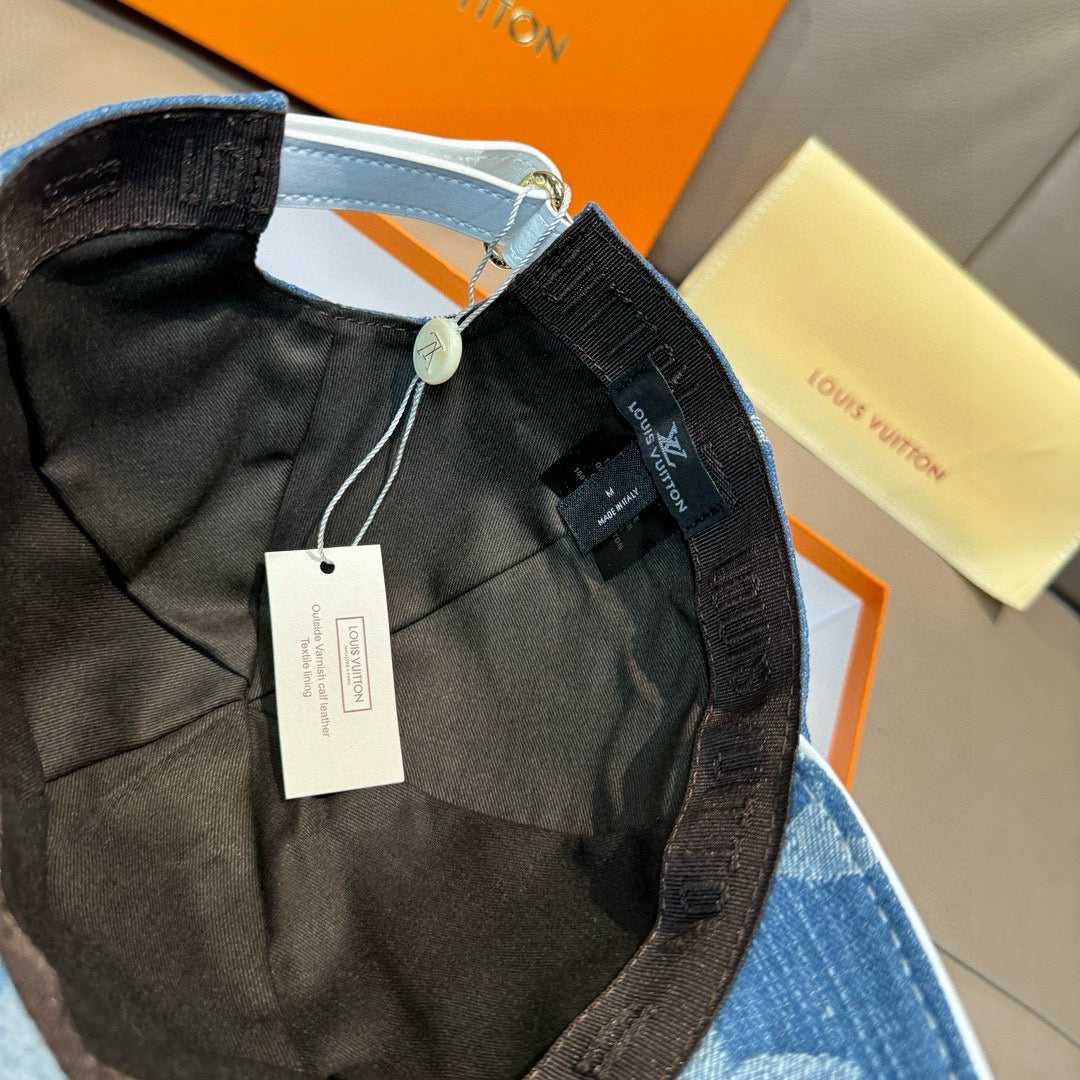 Louis Vuitton cap interior with dark lining and hanging product tags