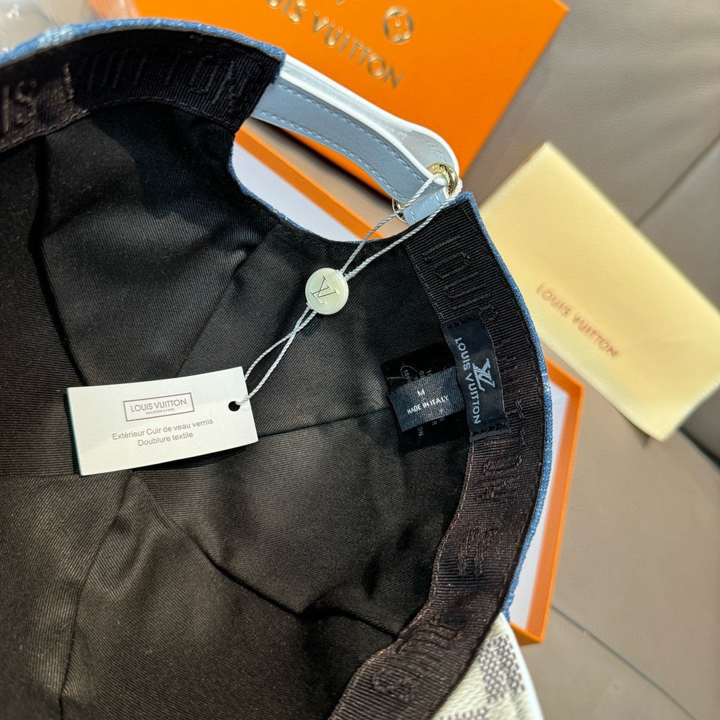Louis Vuitton cap interior with black lining and adjustable strap with tag