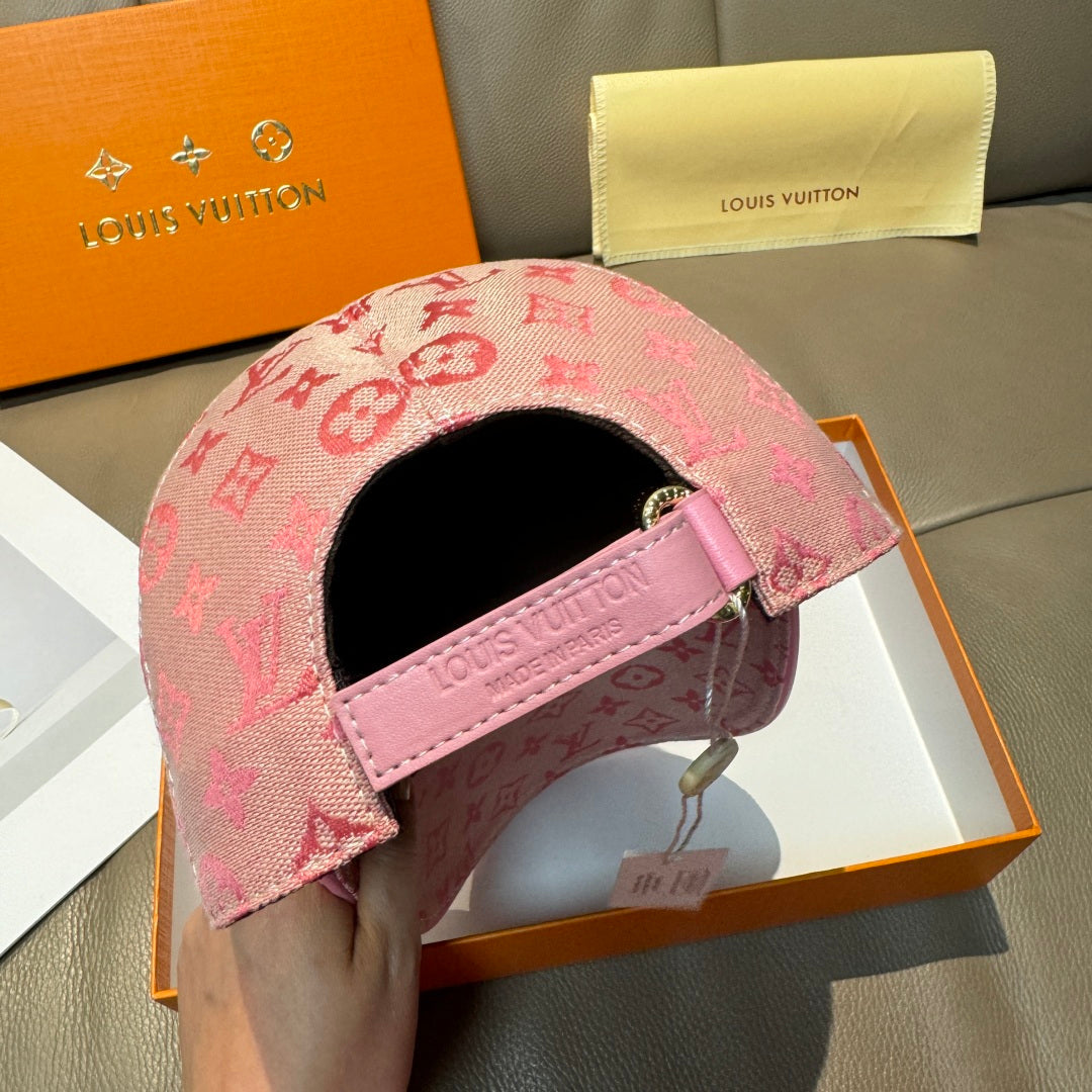 Louis Vuitton pink monogram cap with adjustable strap and black interior lining.