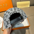 Louis Vuitton monogram cap with dark gray fabric and branded inner leather strap