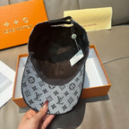 Louis Vuitton monogram cap with dark gray pattern and black mesh back panel