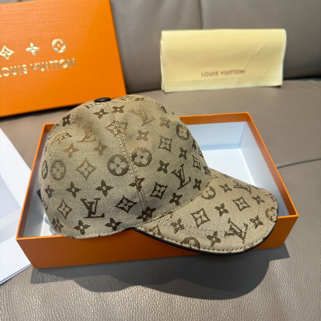 Louis Vuitton monogram baseball cap in tan with dark top button and contrast brim