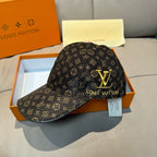 Dark monogram baseball cap with gold Louis Vuitton emblem