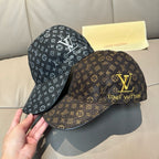 Set of two monogram baseball caps, dark brown and black with gold accents