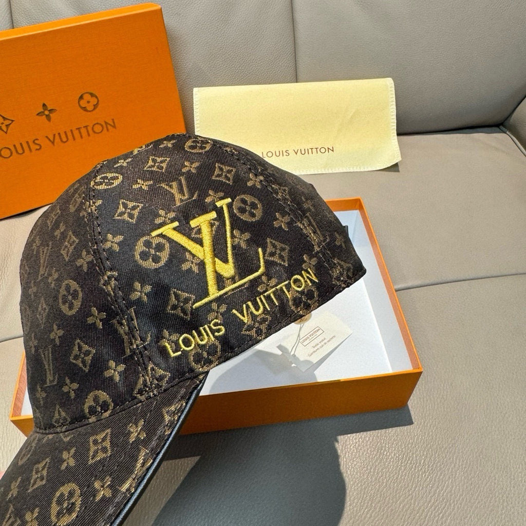 Dark monogram baseball cap with large gold Louis Vuitton emblem, back view