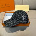 Monogram baseball cap, black with repeated logo pattern and curved brim