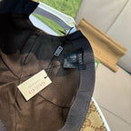 Brown fabric baseball cap interior with size tag and dark brim trim.