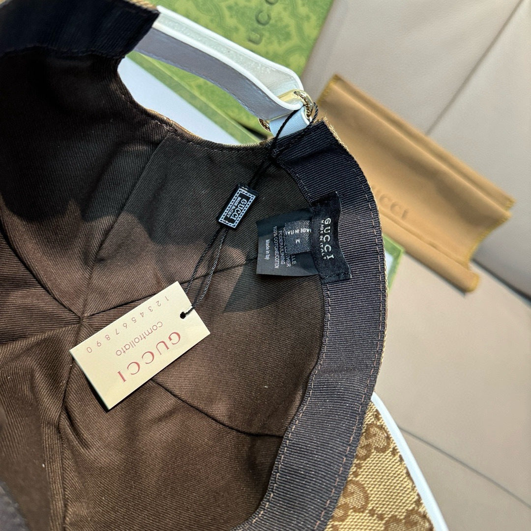 Brown fabric baseball cap interior with size tag and dark brim trim.