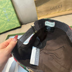 Gucci cap interior with black adjustable strap and brand tags