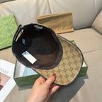 Gucci cap interior in black with beige GG canvas exterior