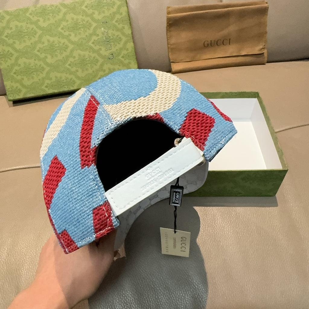 Gucci cap back view, blue-red knit crown with black interior and white strap