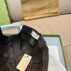 Gucci cap underside view, adjustable strap and white GG jacquard interior