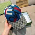 Gucci cap with multicolor geometric knit crown and GG monogram brim, close-up