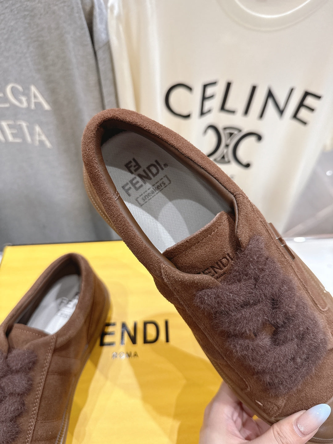 Fendi unisex brown suede slip-on shoe with fuzzy lining near toe