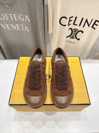 Fendi unisex brown slip-on shoes with fuzzy trim and rubber sole