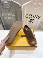 Fendi unisex brown slip-on shoes, sole view with embossed Fendi text