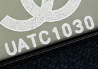 Dark leather tab with white embroidered-style serial text