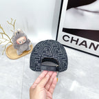 Fendi-style monogram baseball cap with adjustable strap, dark navy repeating pattern