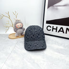 Fendi-style monogram baseball cap, front view, dark navy repeating FF pattern